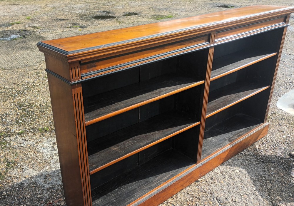 Late Victorian walnut bookcase with ebonised mouldings View III