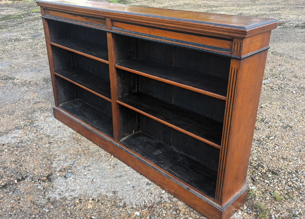 Late Victorian walnut bookcase with ebonised mouldings View IV