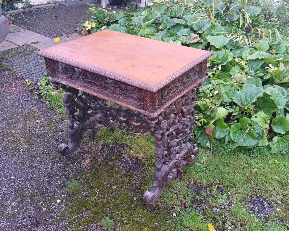 Carved Anglo Indian rosewood side table with drawer. View VII