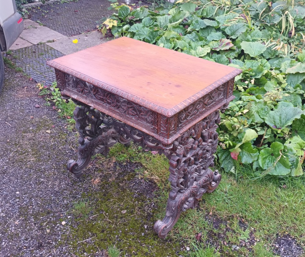 Carved Anglo Indian rosewood side table with drawer. View VIII