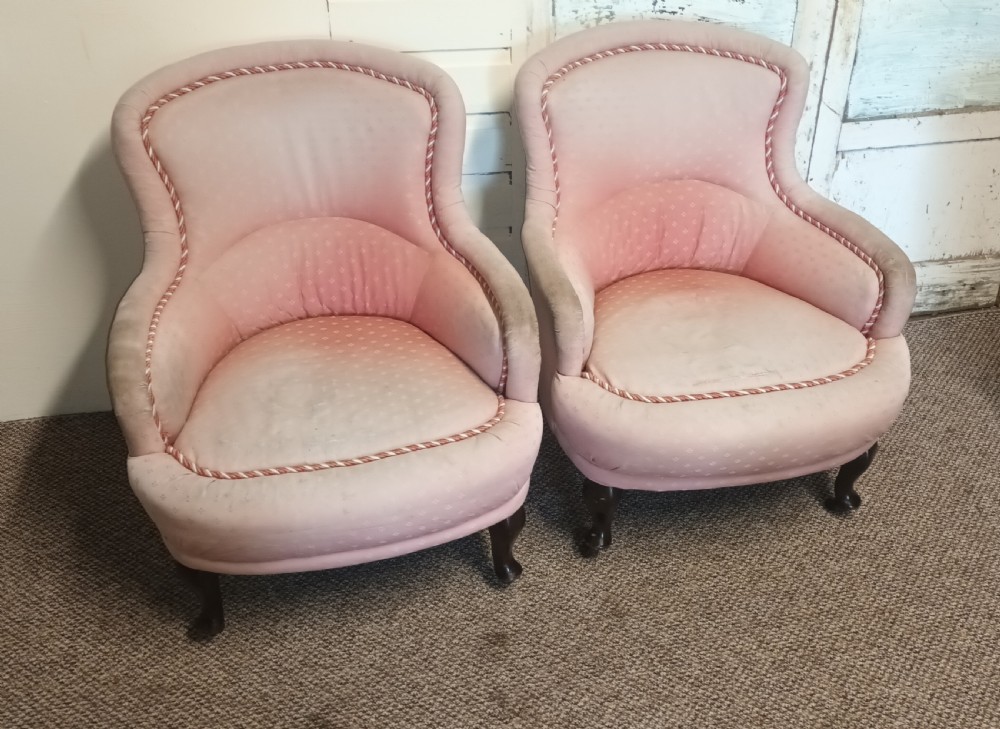 Pair of upholstered bedroom tub chairs of good size.