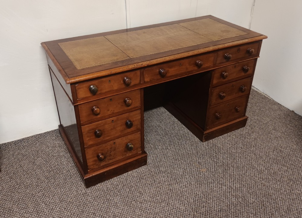 Mid 19th century mahogany free standing pedestal desk.