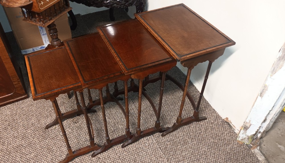 Nest of 4 mahogany occasional table. View V