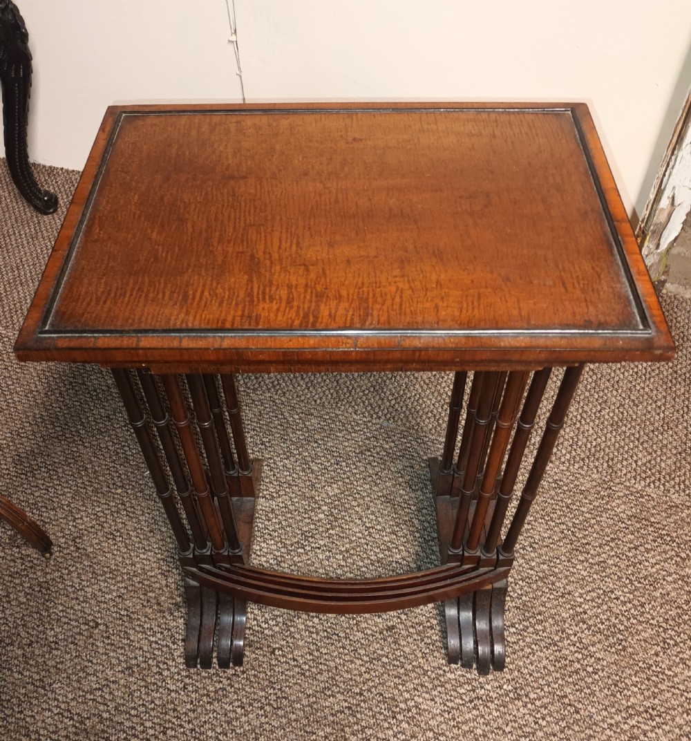 Nest of 4 mahogany occasional table. View VI