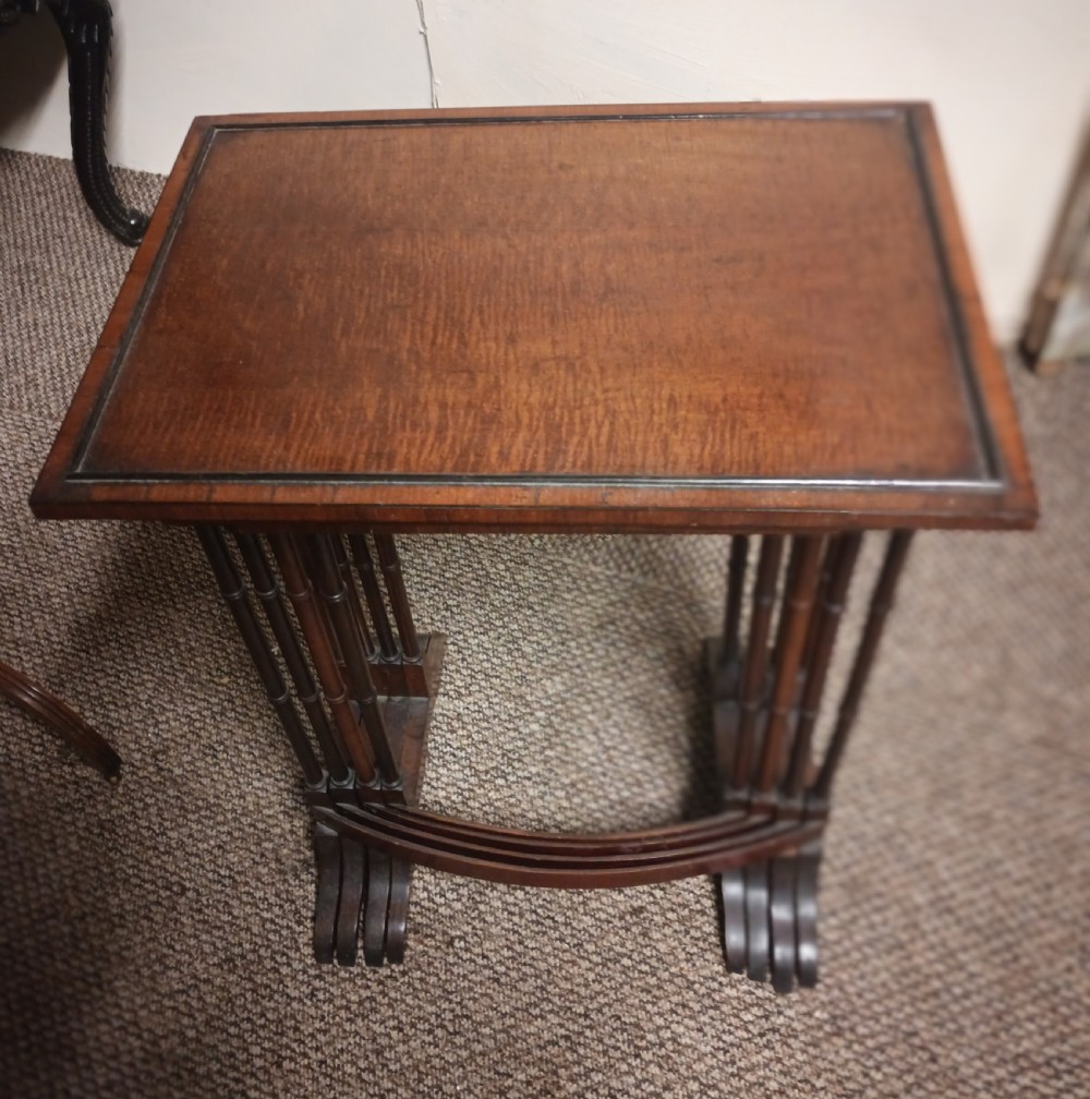 Nest of 4 mahogany occasional table. View VII