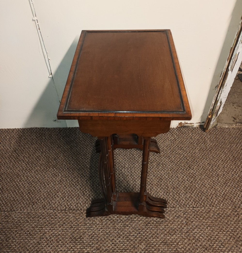 Nest of 4 mahogany occasional table. View X