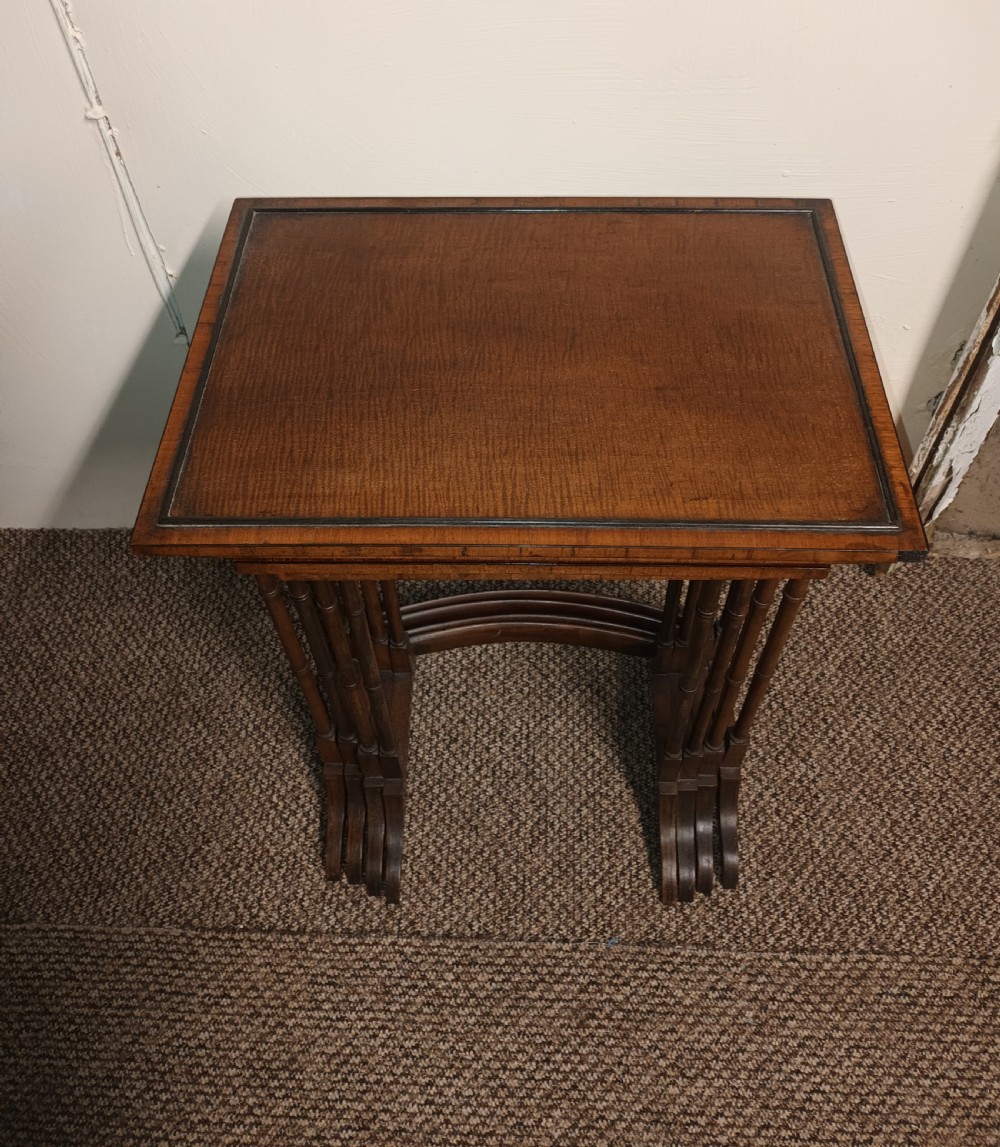 Nest of 4 mahogany occasional table. View XI