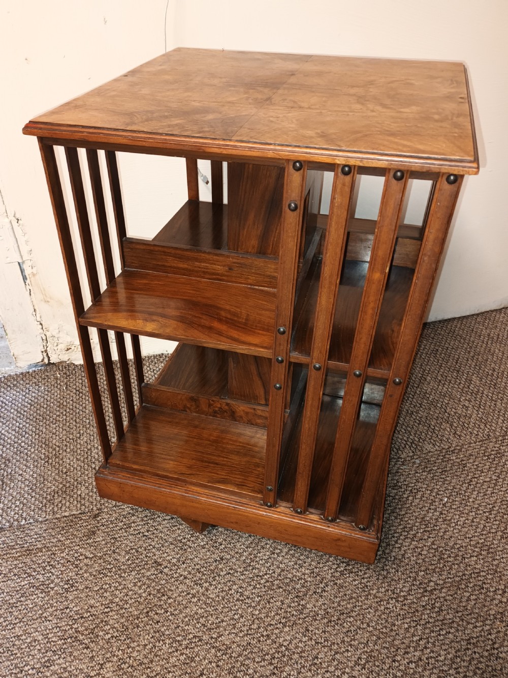 Late Victorian walnut revolving bookcase. 