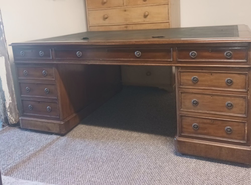 Large Late Victorian mahogany pedestal partners desk.  View IX