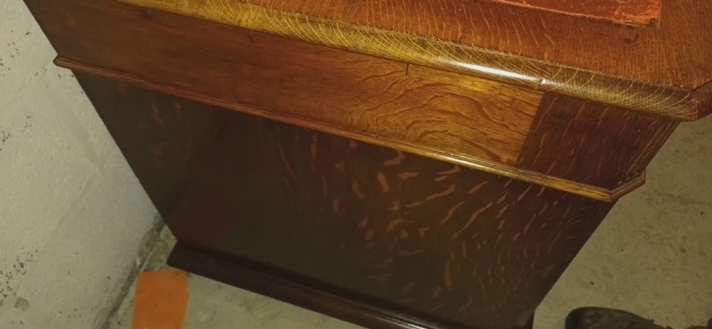 Late Victorian oak kneehole pedestal desk with side slides. View IX