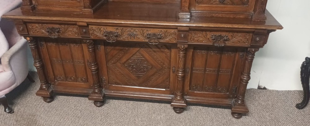 Late 19th century carved oak side cabinet.  View IV