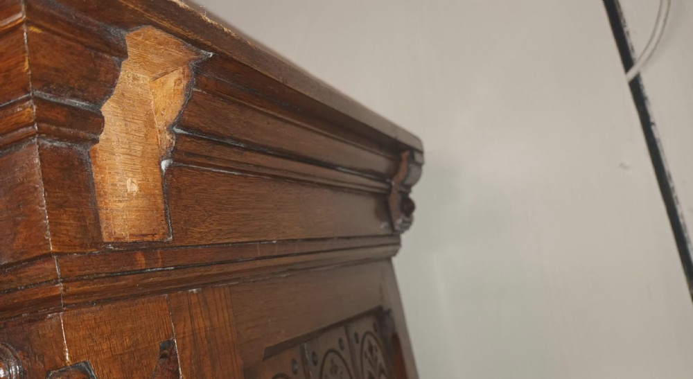 Late 19th century carved oak side cabinet.  View XII