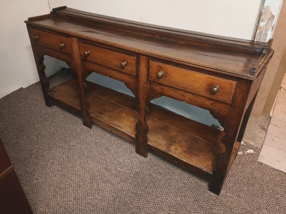 Late Georgian oak dresser.  View XIII