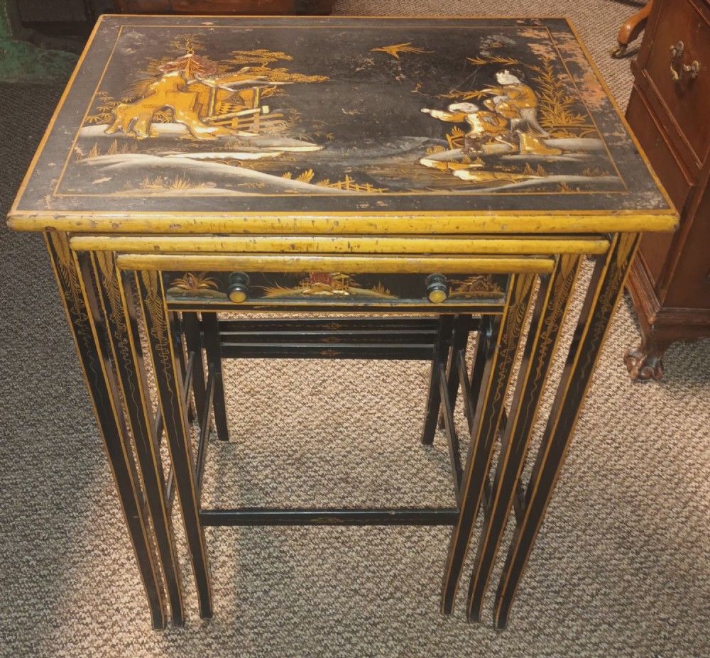 Nest of 3 lacquered tables. View III
