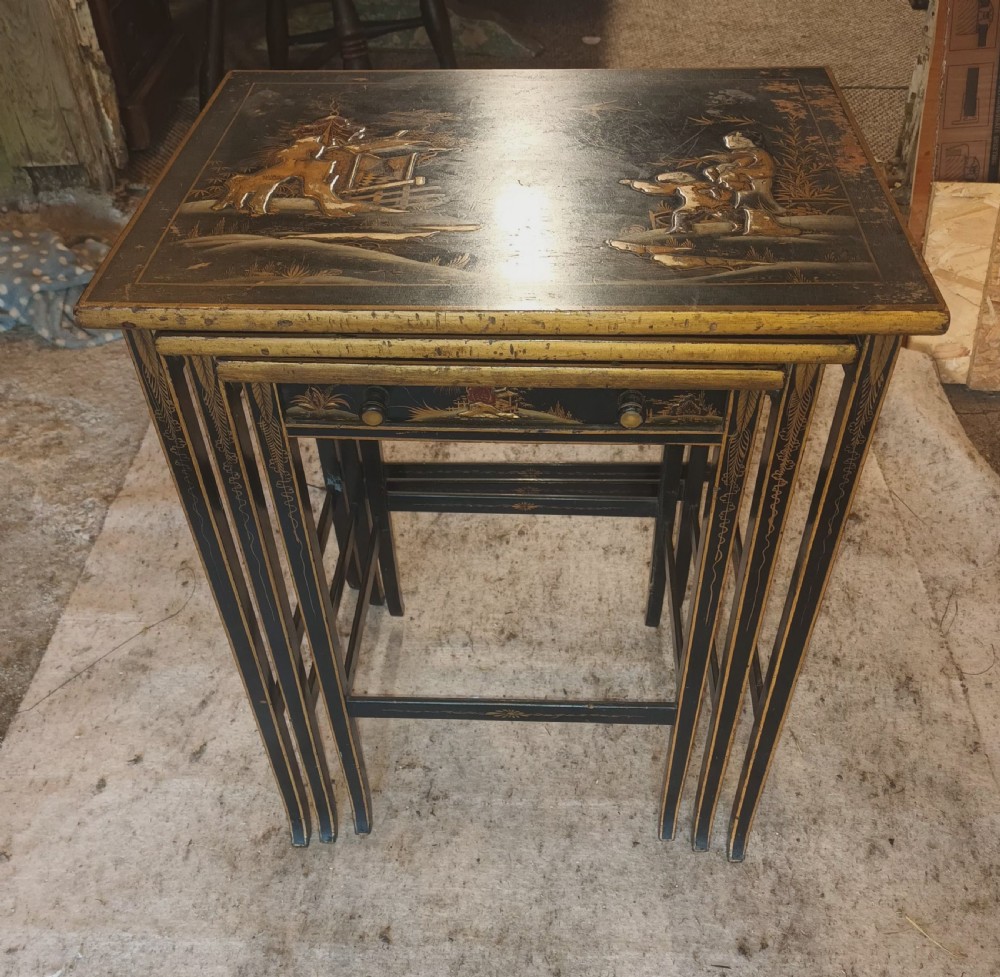 Nest of 3 lacquered tables. View IV