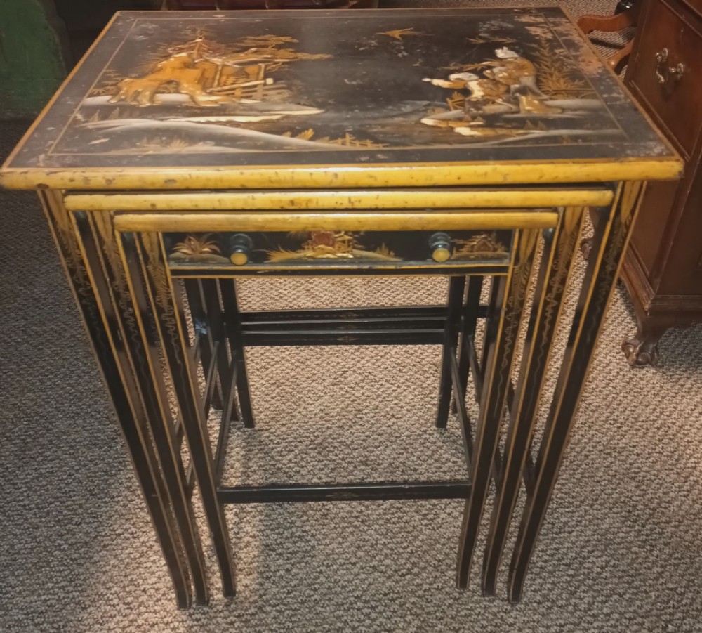 Nest of 3 lacquered tables. View V