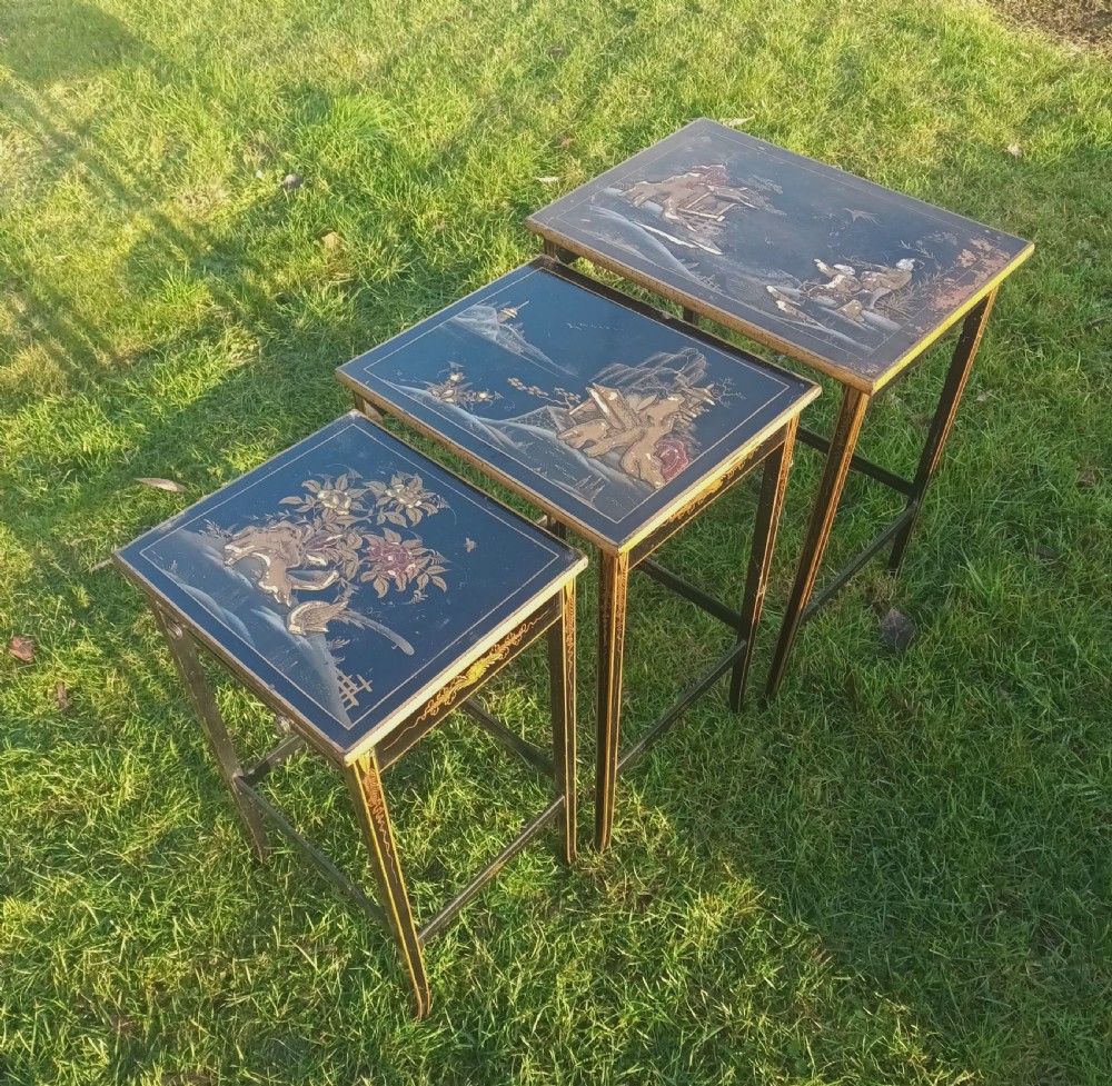Nest of 3 lacquered tables. View XII