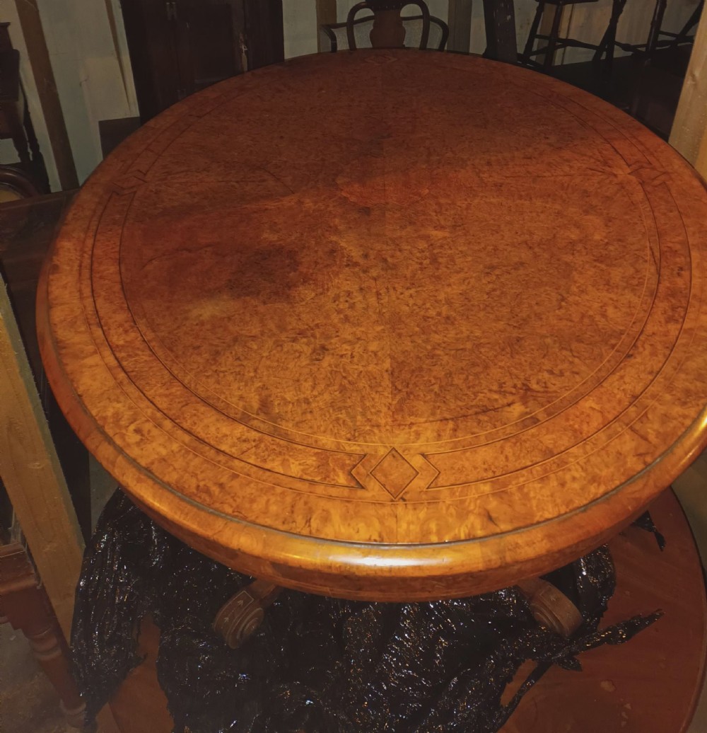 Victorian inlaid oval walnut centre table  View II