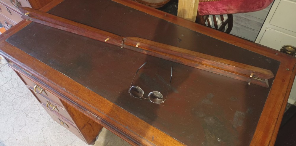 Late Victorian mahogany naval campaign pedestal desk.  View II