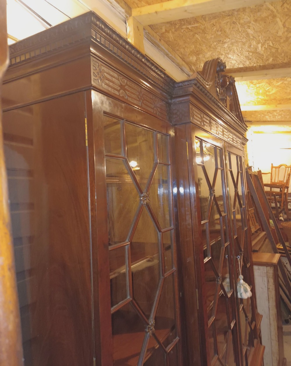 Good quality early 20th century mahogany breakfront library bookcase.  View IX