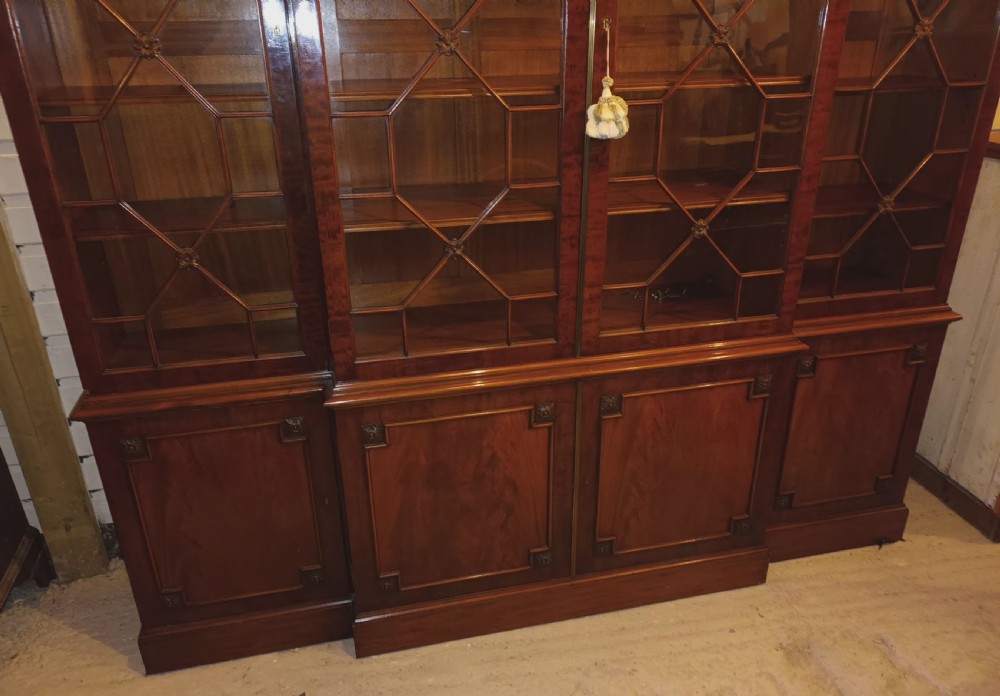 Good quality early 20th century mahogany breakfront library bookcase.  View X