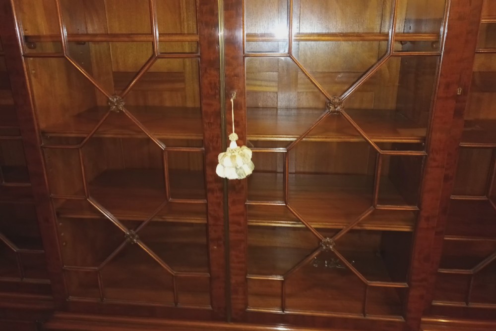 Good quality early 20th century mahogany breakfront library bookcase.  View XI