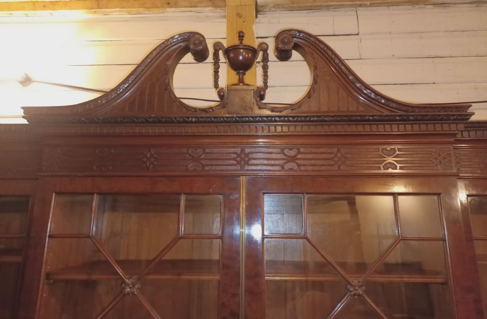Good quality early 20th century mahogany breakfront library bookcase.  View XII