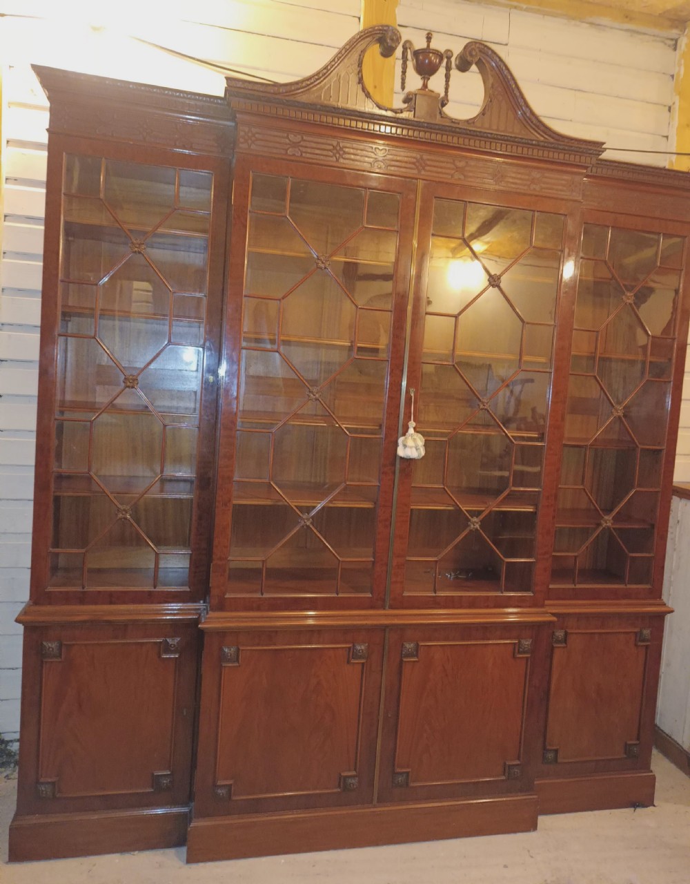 Good quality early 20th century mahogany breakfront library bookcase.  View XX