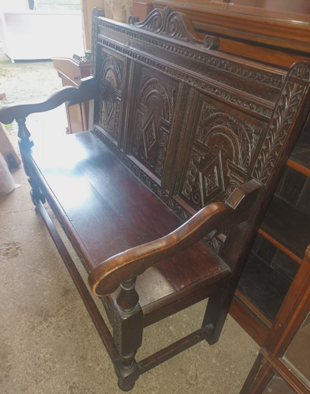 Late Victorian carved oak hall bench. View IV