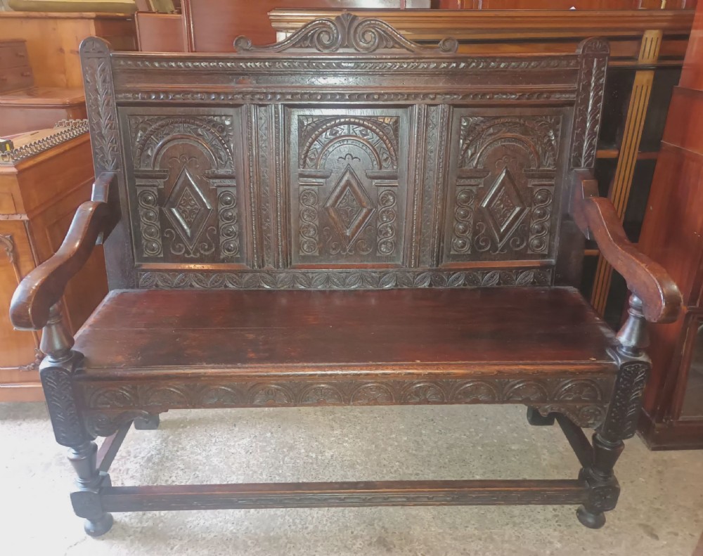 Late Victorian carved oak hall bench. View V