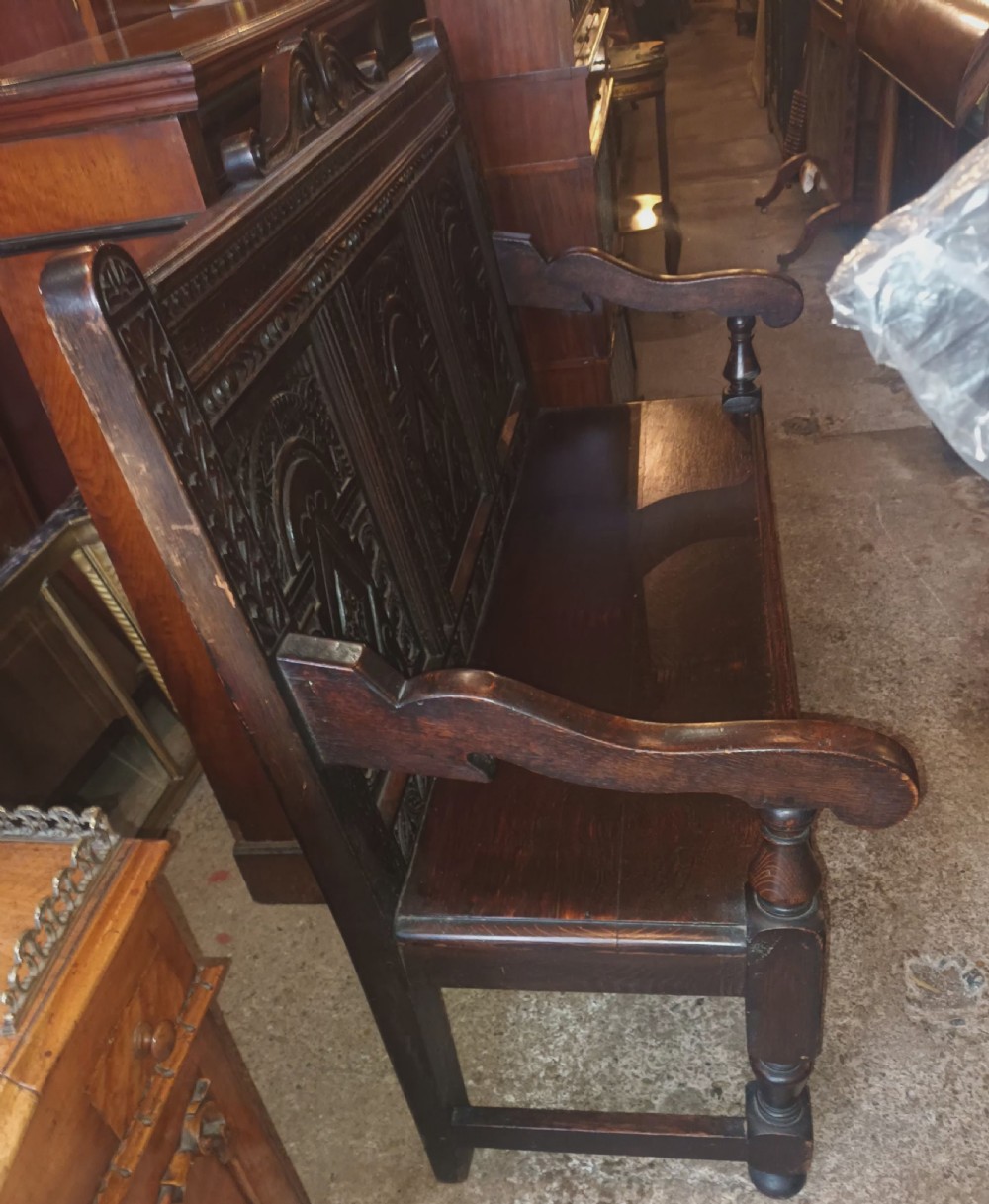 Late Victorian carved oak hall bench. View VI