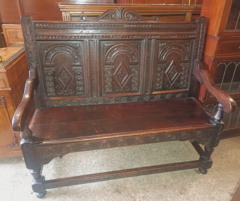 Late Victorian carved oak hall bench. View VII