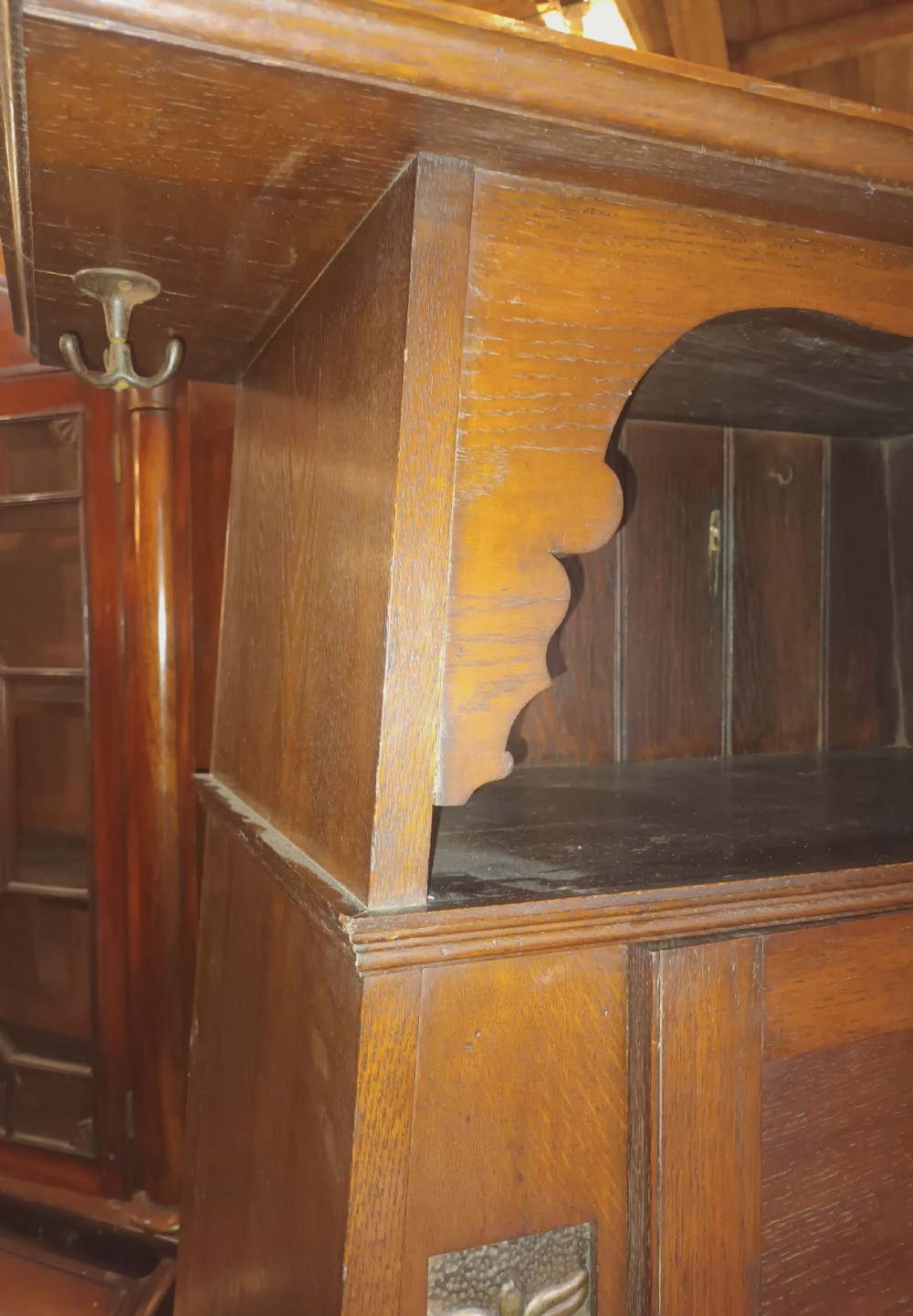 Useful oak arts and crafts hall wardrobe of compact size. View V