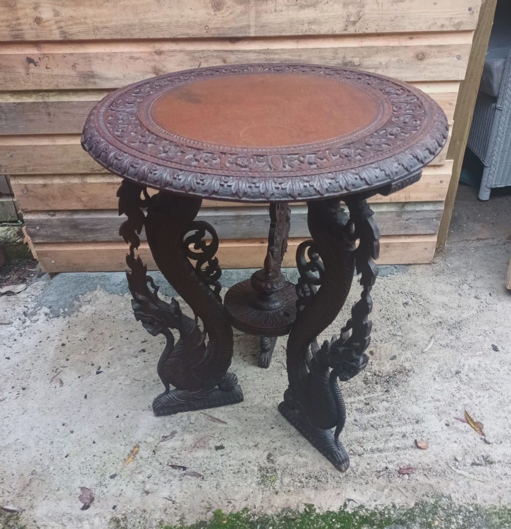 Carved Burmese occasional table.
