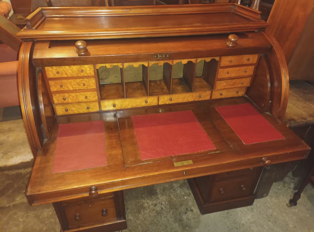 Victorian cylinder top kneehole pedestal writing desk. View V