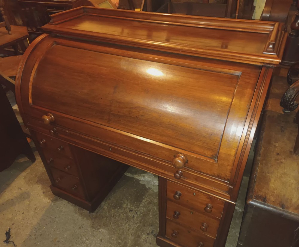 Victorian cylinder top kneehole pedestal writing desk. View VII