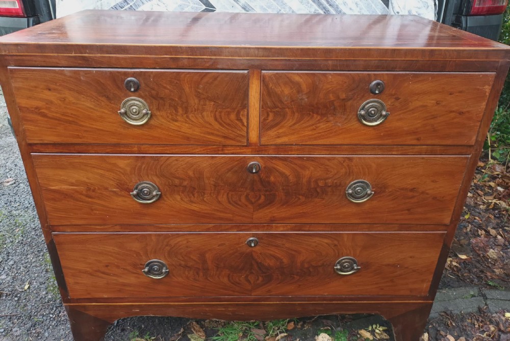 Small 19th century inlaid mahogany chest of drawers.  View IV