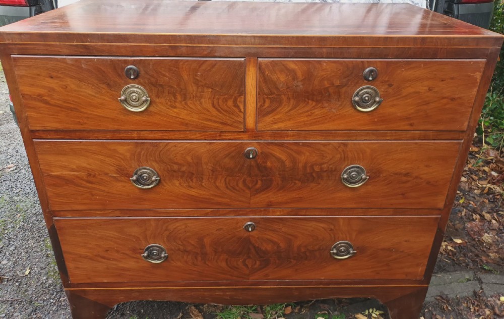 Small 19th century inlaid mahogany chest of drawers.  View V