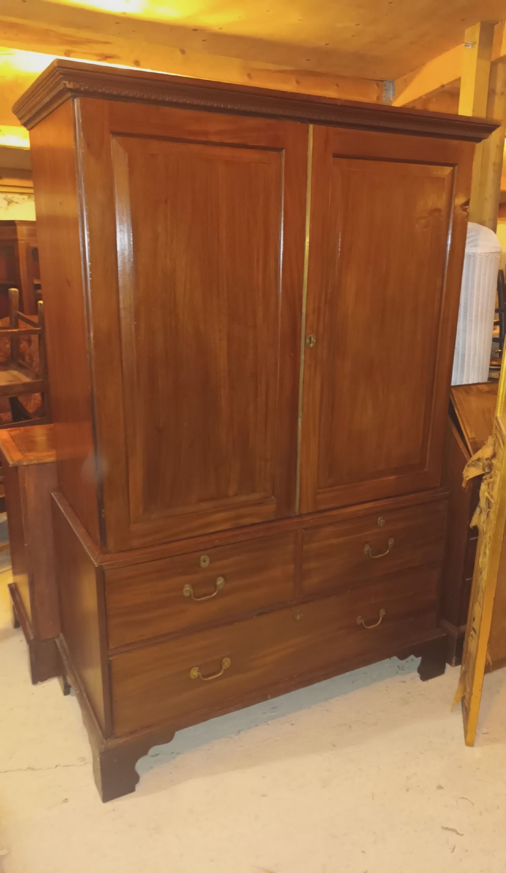 Georgian mahogany housekeepers linen cupboard with sliding trays