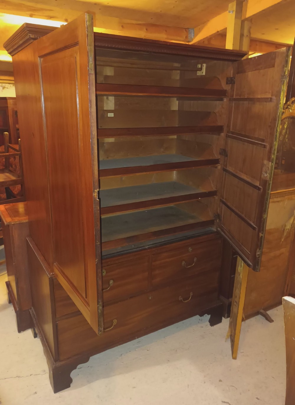 Georgian mahogany housekeepers linen cupboard with sliding trays View II
