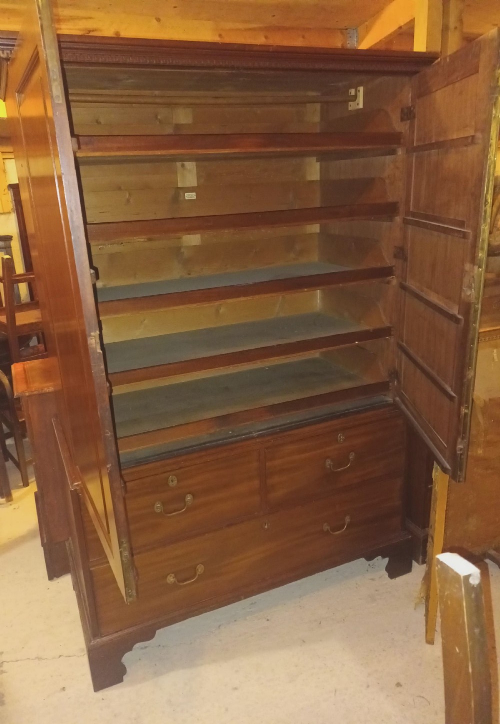 Georgian mahogany housekeepers linen cupboard with sliding trays View III