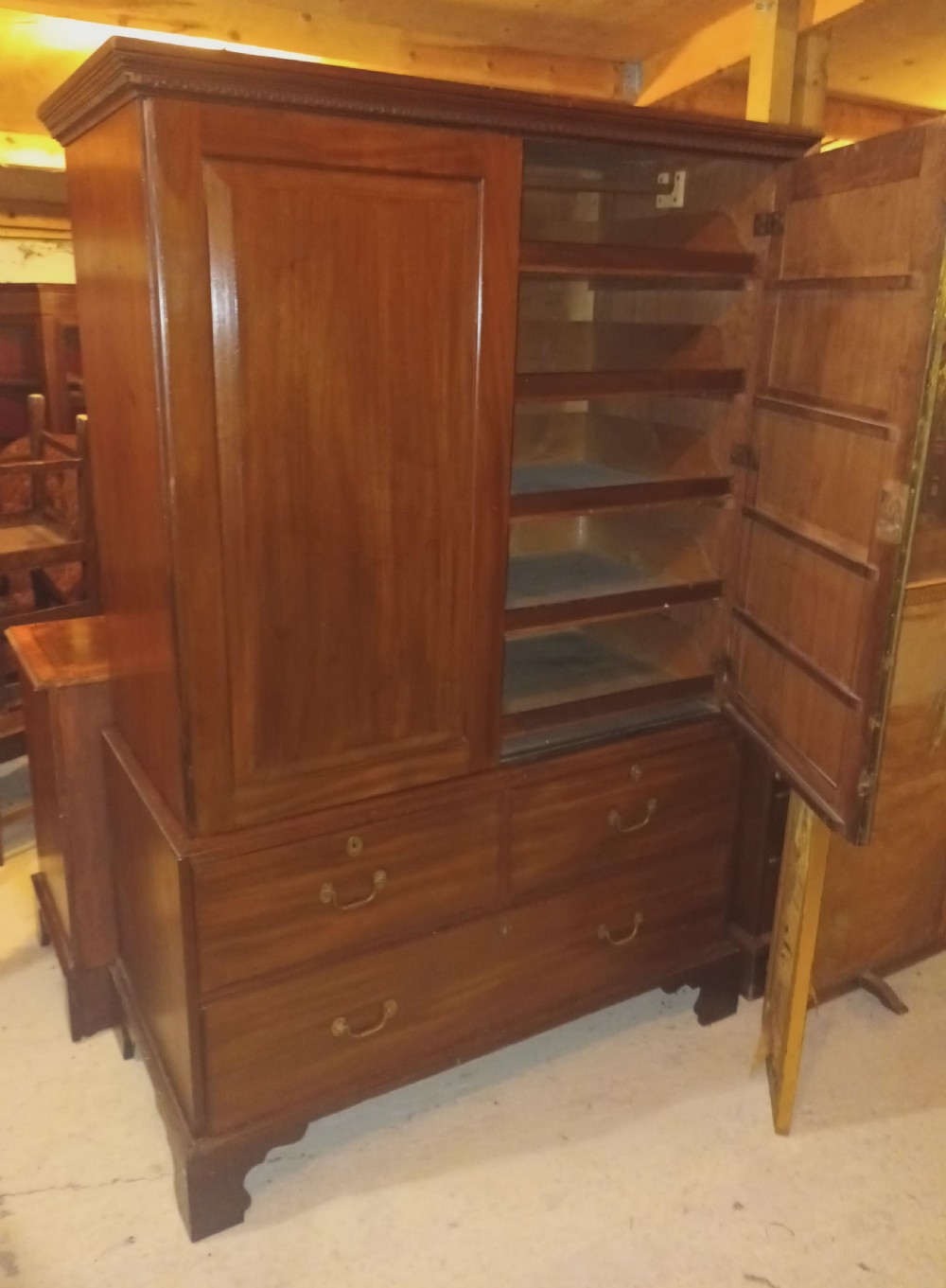 Georgian mahogany housekeepers linen cupboard with sliding trays View IV