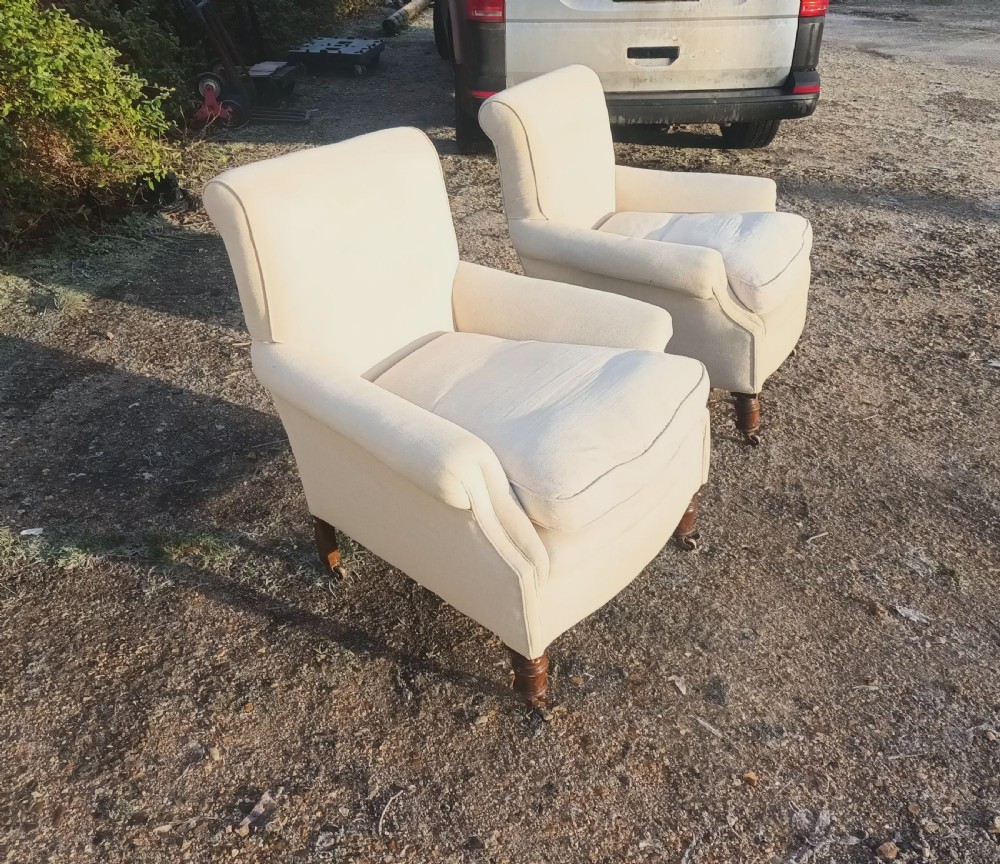Pair of comfortable Edwardian upholstered armchairs.  View X