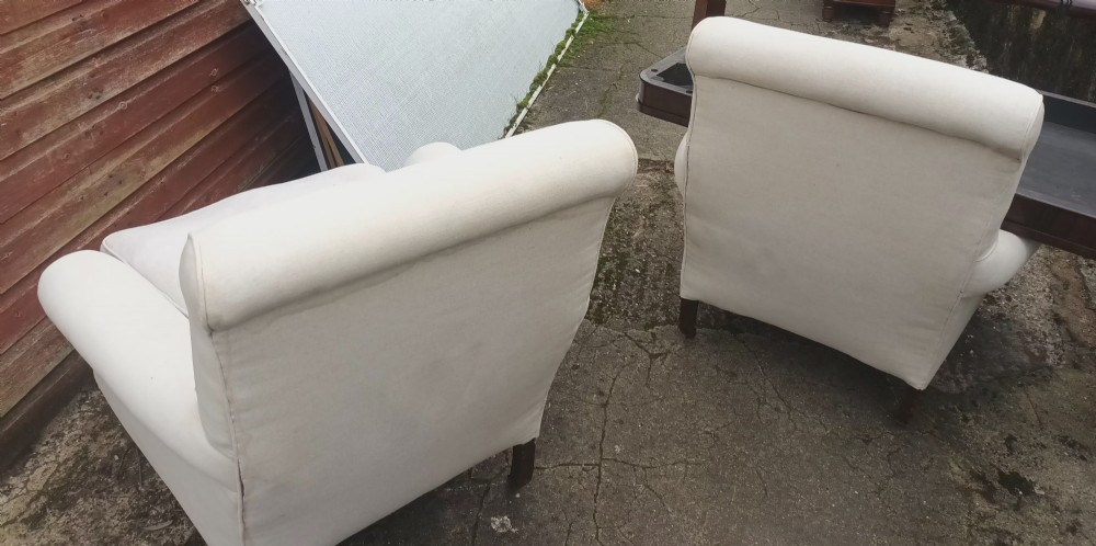Pair of comfortable Edwardian upholstered armchairs.  View XIV