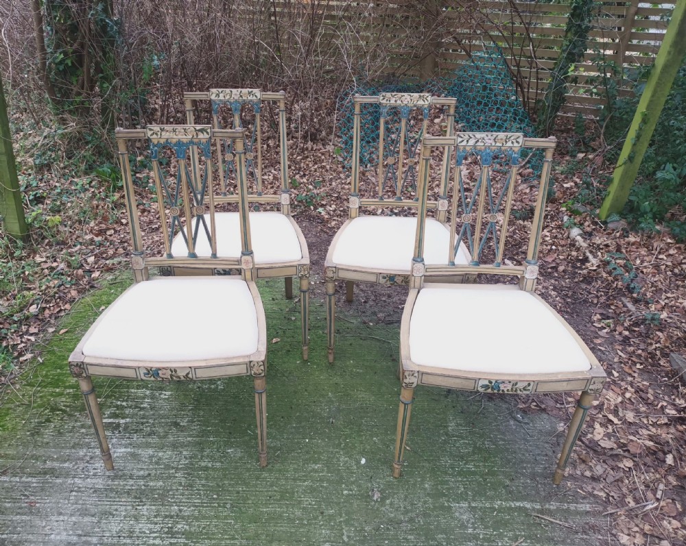 Set of 4 painted and decorated side chairs. View II