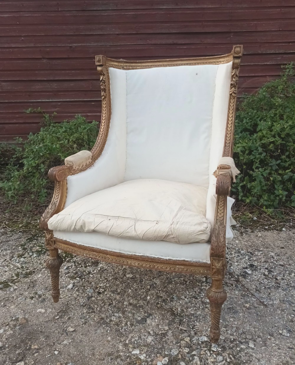 Late 19th century carved giltwood upholstered armchair . View II