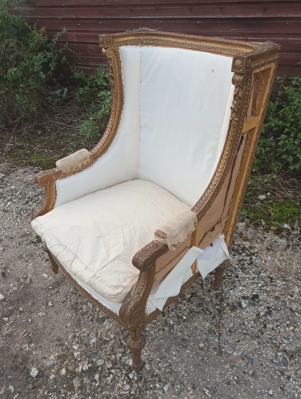Late 19th century carved giltwood upholstered armchair . View III