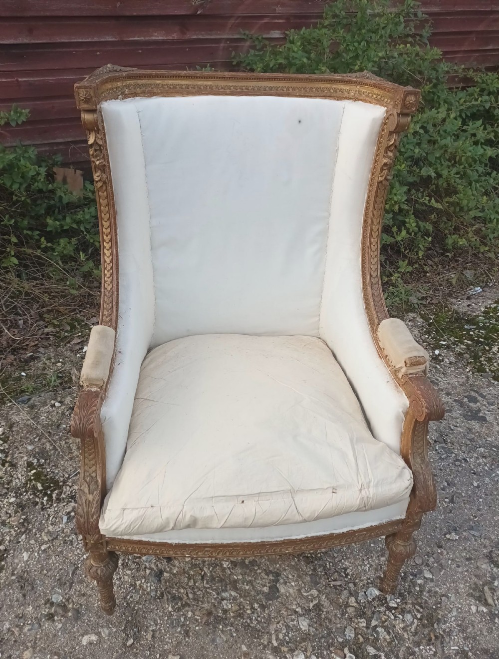 Late 19th century carved giltwood upholstered armchair . View V