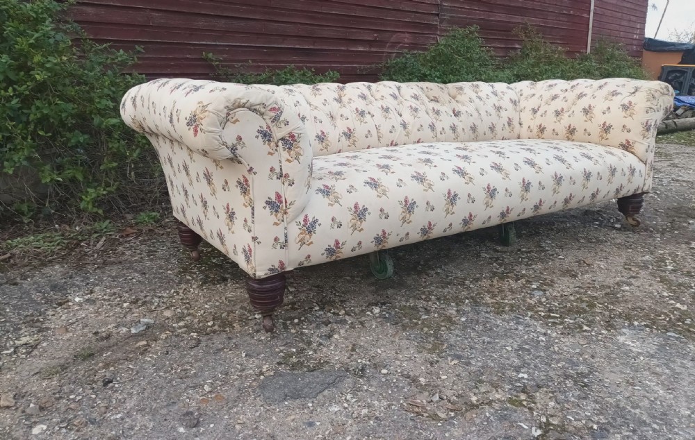 Large Victorian country house button back roll arm Chesterfield sofa .