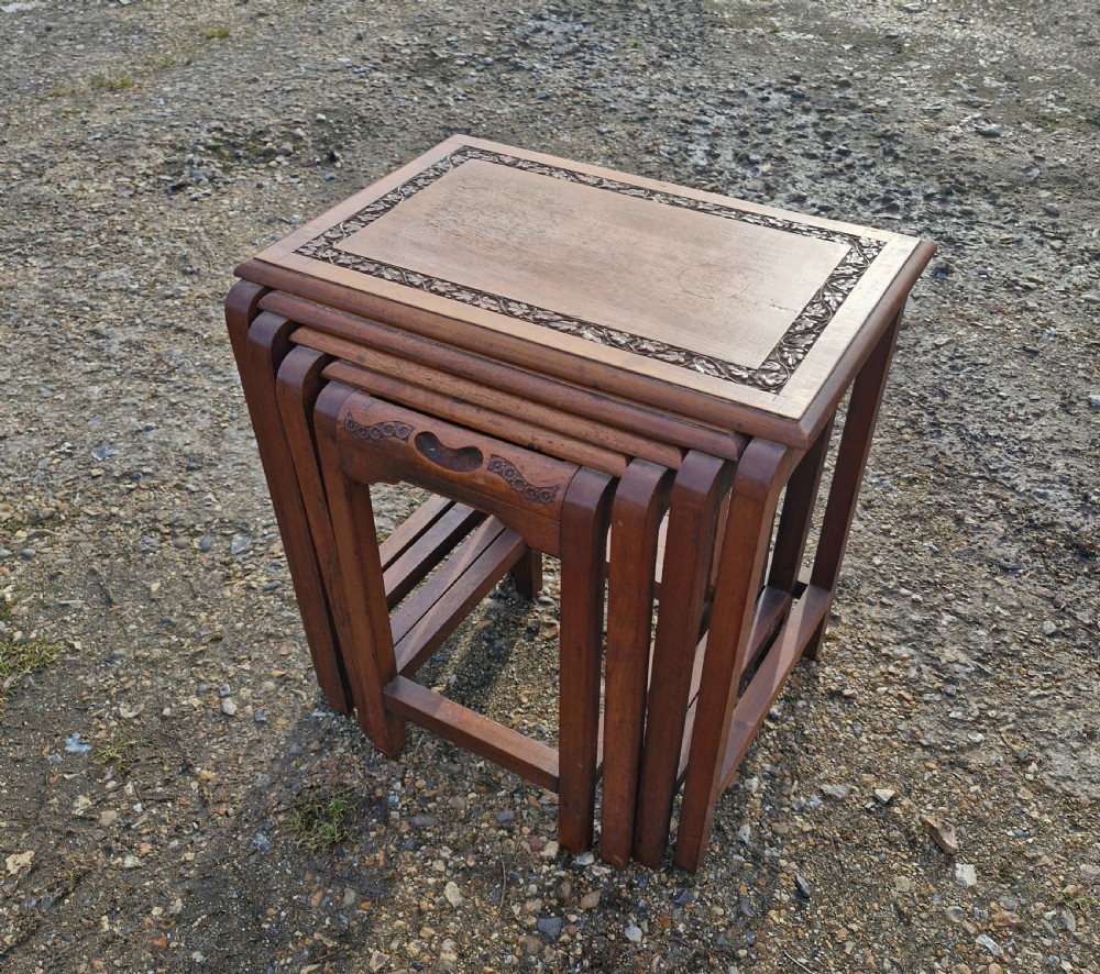 Nest of 4 Anglo Indian occasional tables.